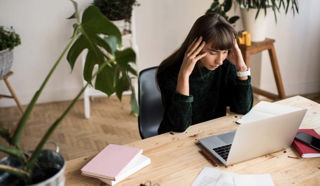 Frustrated woman at computer